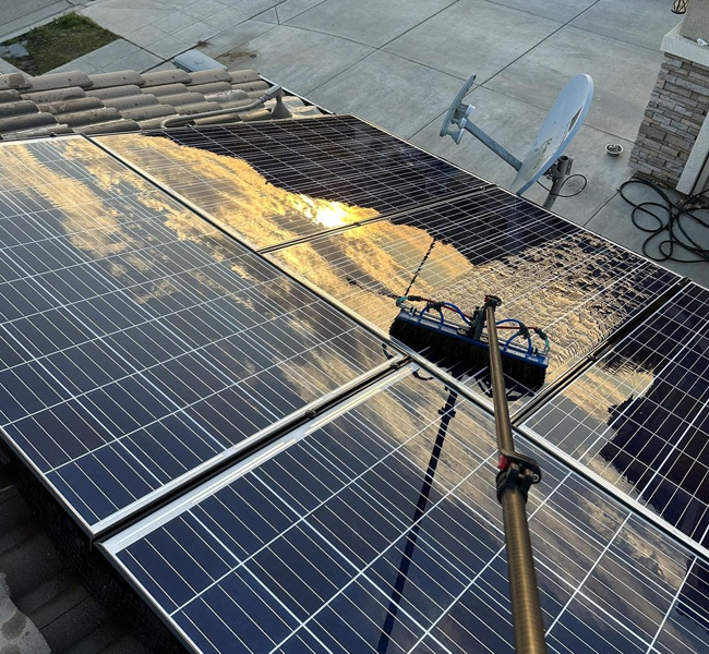 Clean solar panel reflecting the sunset in fresno