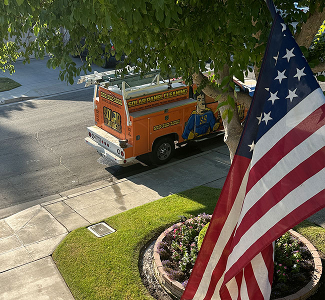 Solar Scrubbers Truck Parked and American Flag